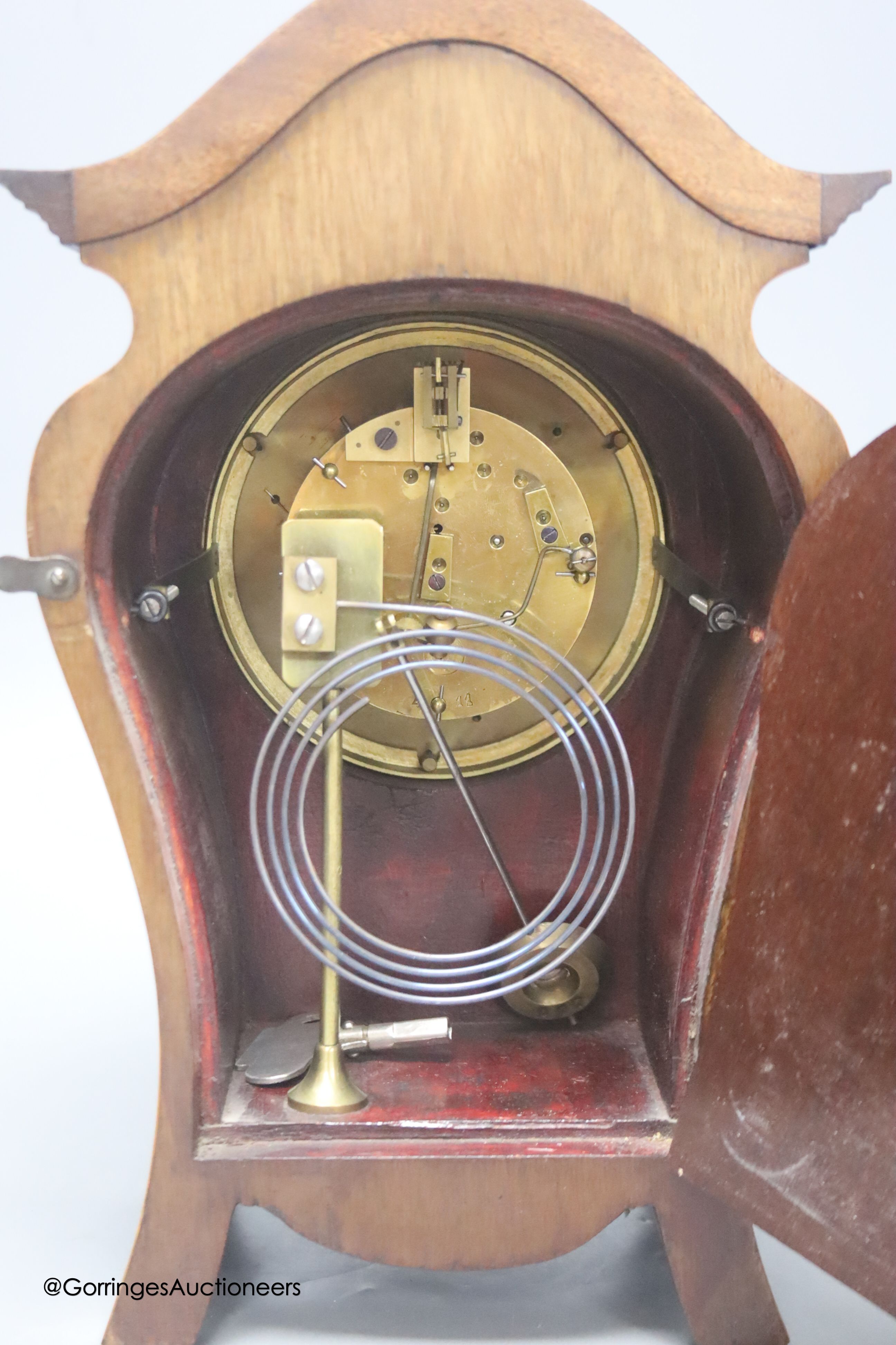 An Edwardian marquetry inlaid mantel clock, height 32cm